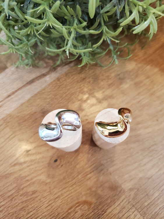 Photo bague cage , colorie or et argent.