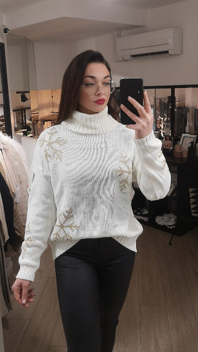 Pull col roulé motif flocon doré. photo porté, colorie blanc