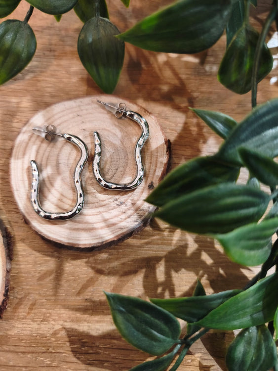 Boucle d'oreille Dali, colorie Argent.