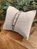 Bracelet 2 rangs strass et pampilles. Colorie Argent. 