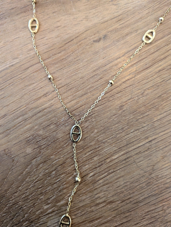 Collier pendant grain de café. Colorie or.