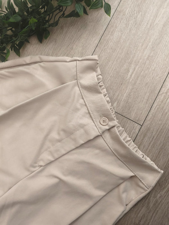 Pantalon large taille haute. colorie beige
