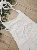 Robe longue en tissus effet froufrou. dos nue. Photo détail dos. colorie blanc. 