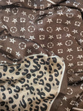 Grand foularda motif étoile et léopard. colorie marron