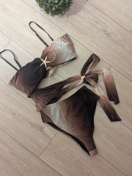 Ensemble composé d'un body et d'une jupe en voile imprimé. photo du body. Colorie marron