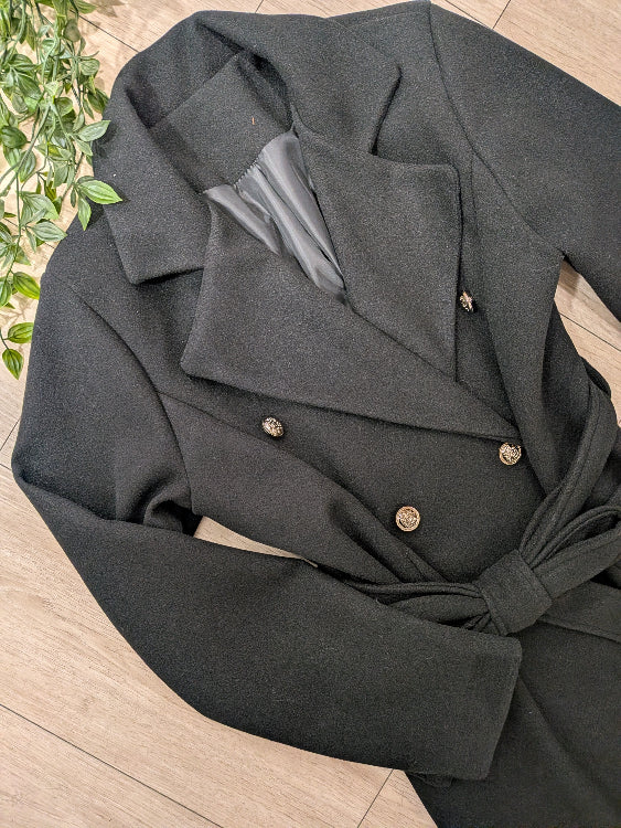Manteau caban colorie noir photo a plat.  