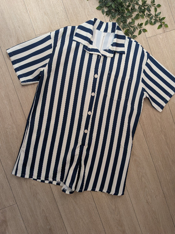 Combishort bleu marine a rayures blanches. 