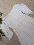 Robe épaules nues en gaz de coton blanc. 