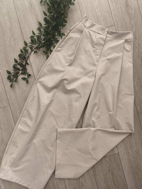 Pantalon large taille haute. colorie beige