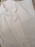 Chemise sans manches nœud. colorie Blanc . Photo détail nœud.