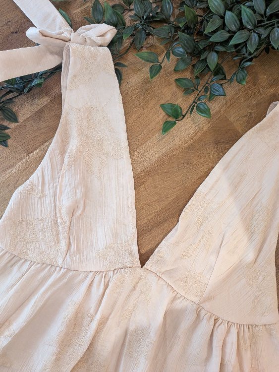 Ensemble fluide composé d'un débardeur et d'un pantalon . photo détail colorie beige