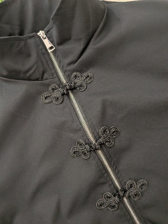 Blouson style Qipao. photo a plat colorie Noir.