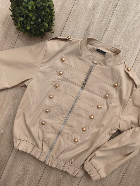 Blouson officier, colorie beige . photo a plat