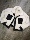 Photo a plat de la veste bi-matiere blanche
